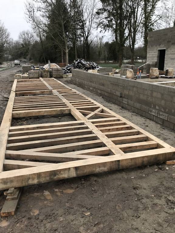 Pan de bois et colombages fabriqués en atelier