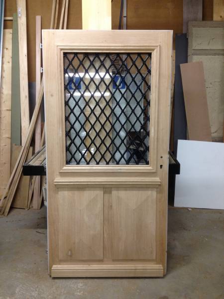 Remplacement d’une porte d’entrée vitrée bois massif proche Fauvile-en-Caux (76)